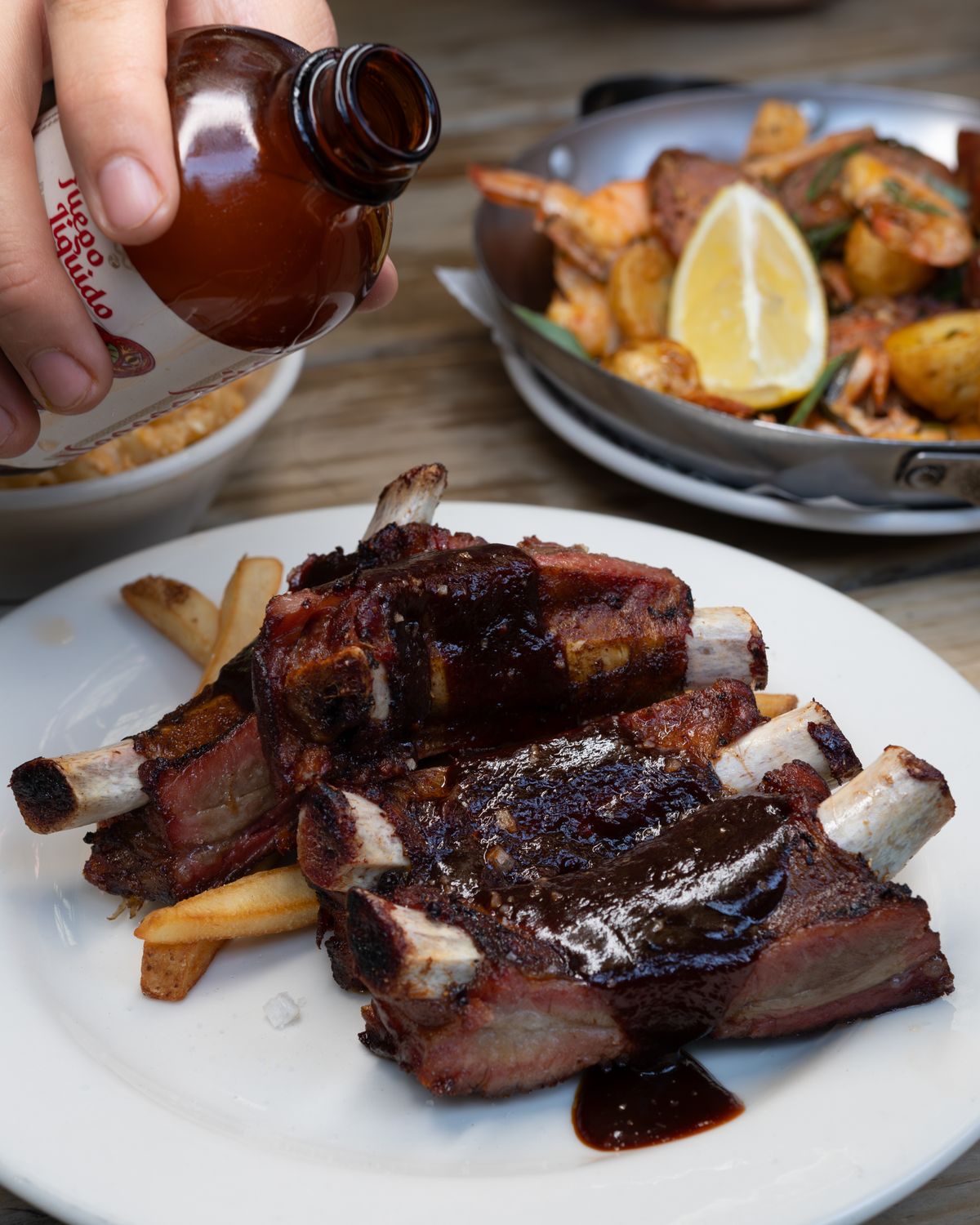 Barbecue sauce poured over ribs